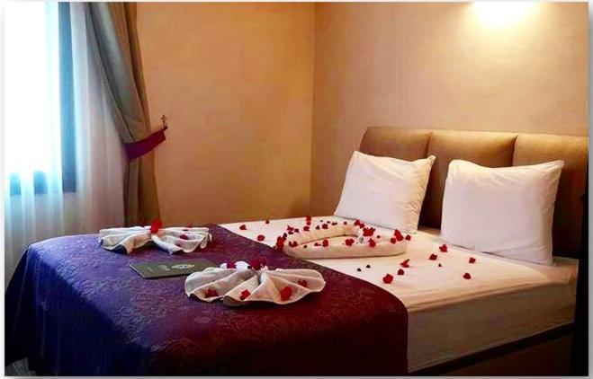 Akbuek Tas Otel Bagian luar foto